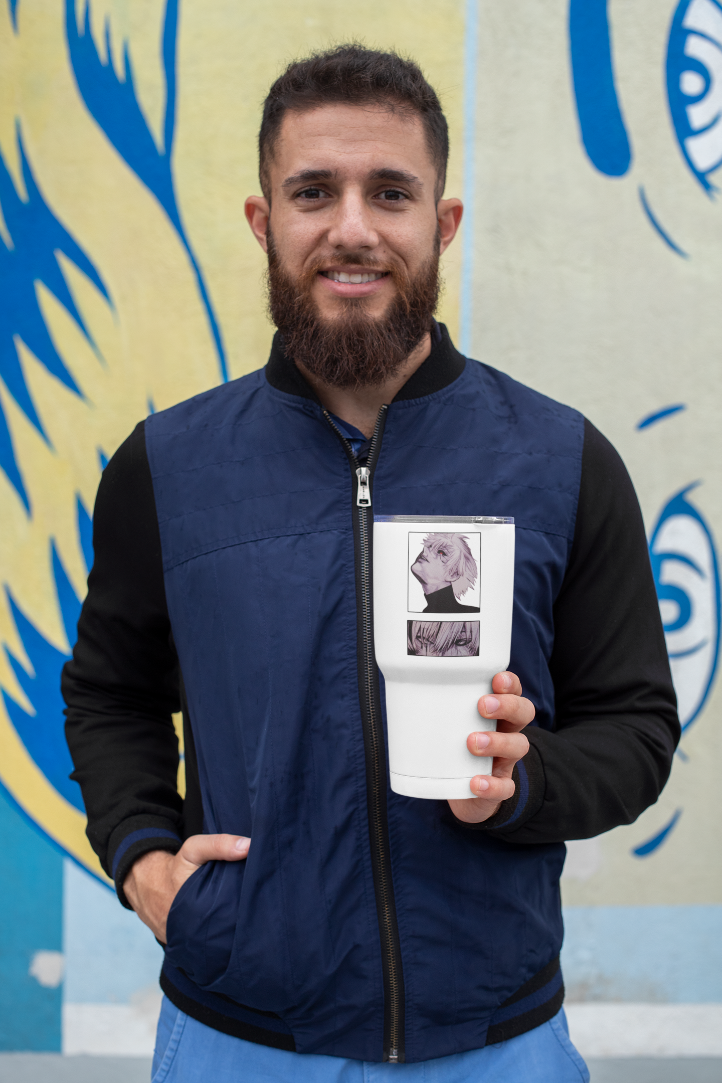 a man holding a cup with a picture on it