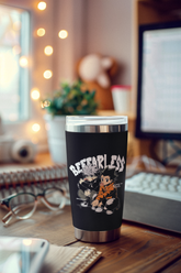 a coffee cup sitting on top of a wooden desk
