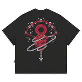 a black t - shirt with a red heart on it