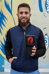 a man with a beard holding a book