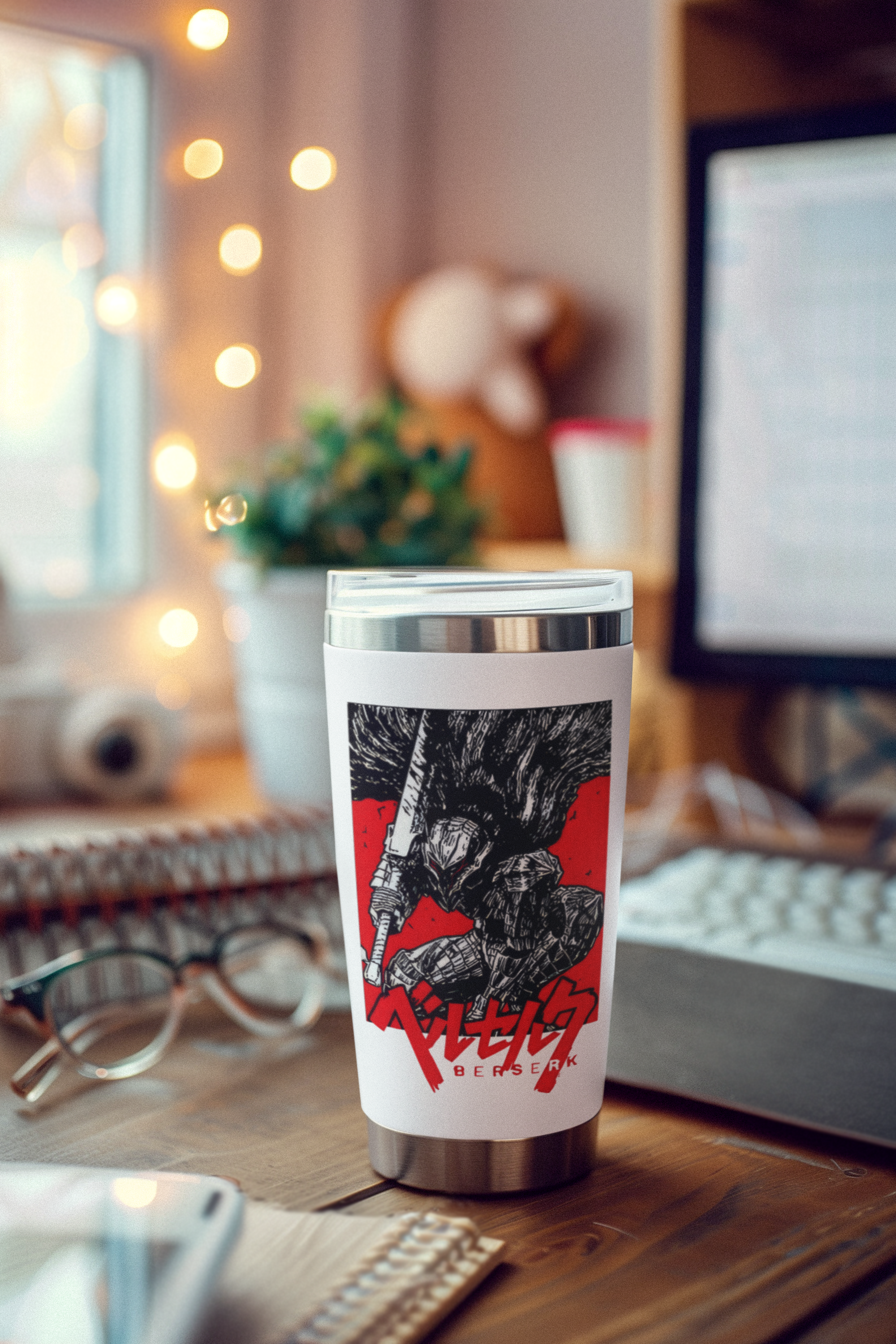 a coffee cup sitting on top of a wooden desk