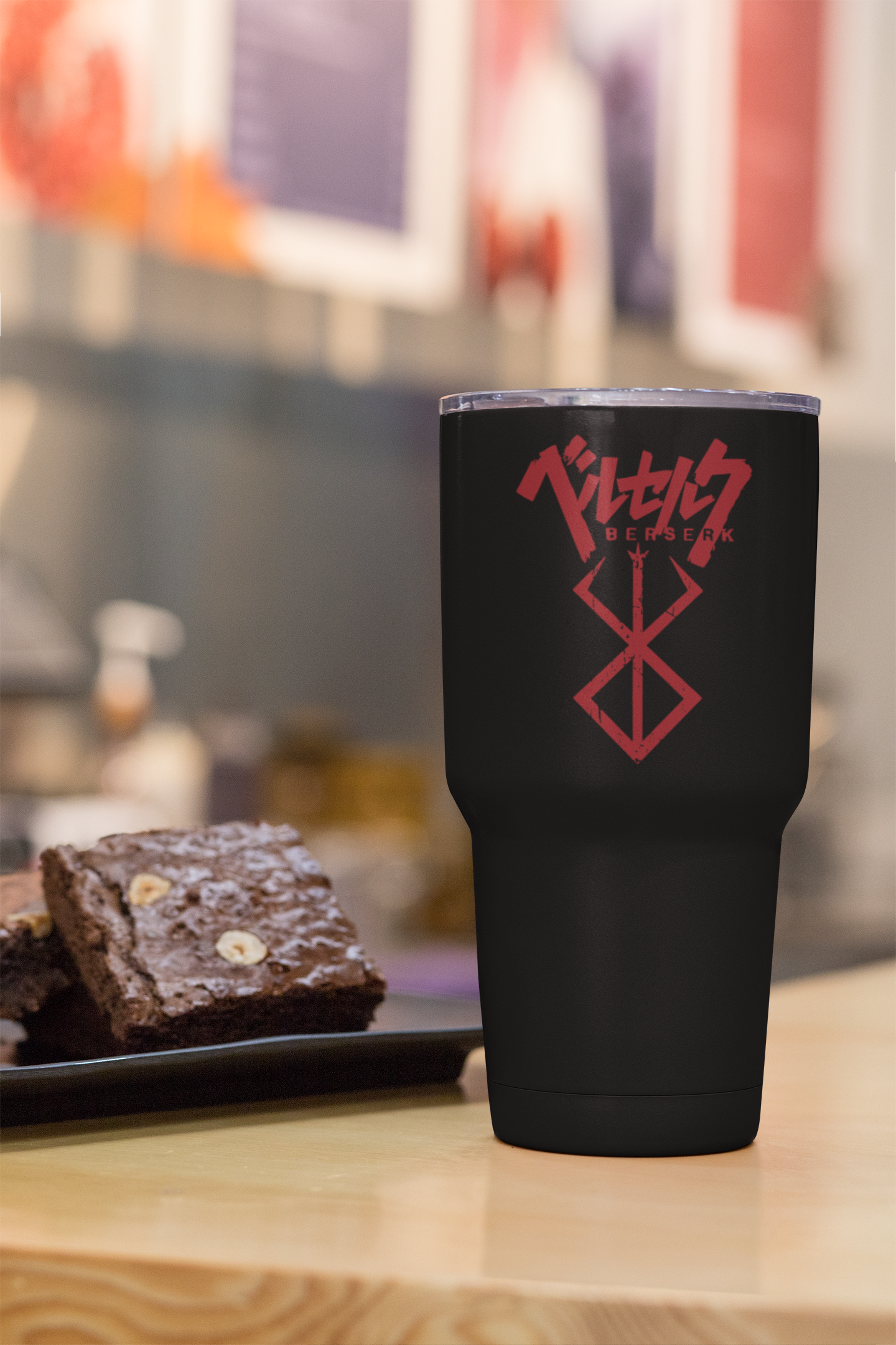 a cup of coffee and some brownies on a table