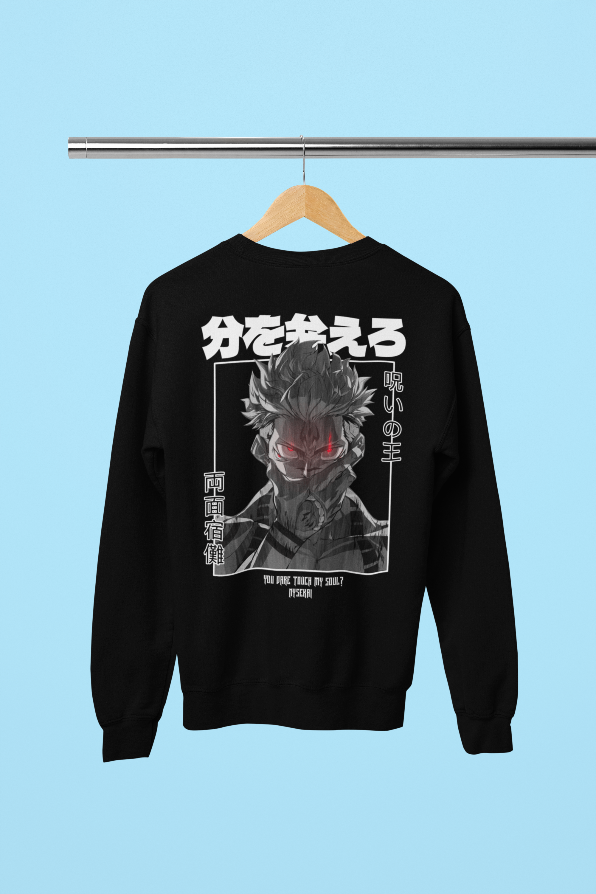 a black sweatshirt with a picture of a demon on it