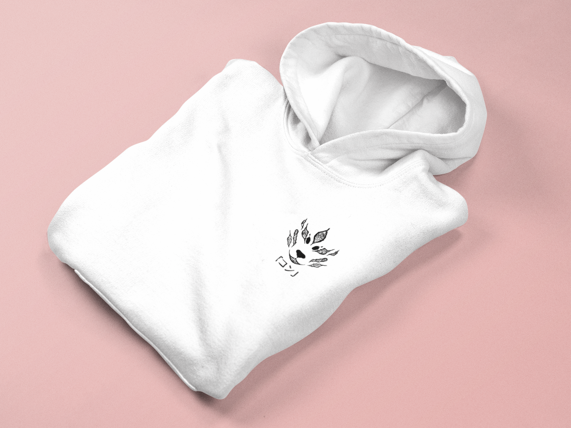 a white hoodie with a black and white bird on it