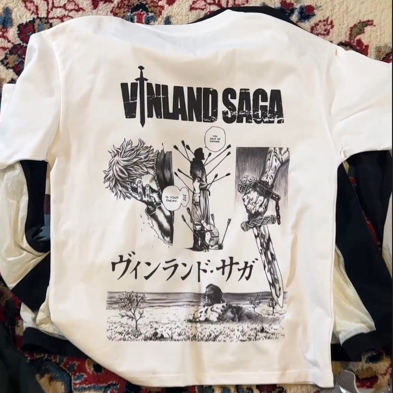 a t - shirt with a picture of a man holding a sword