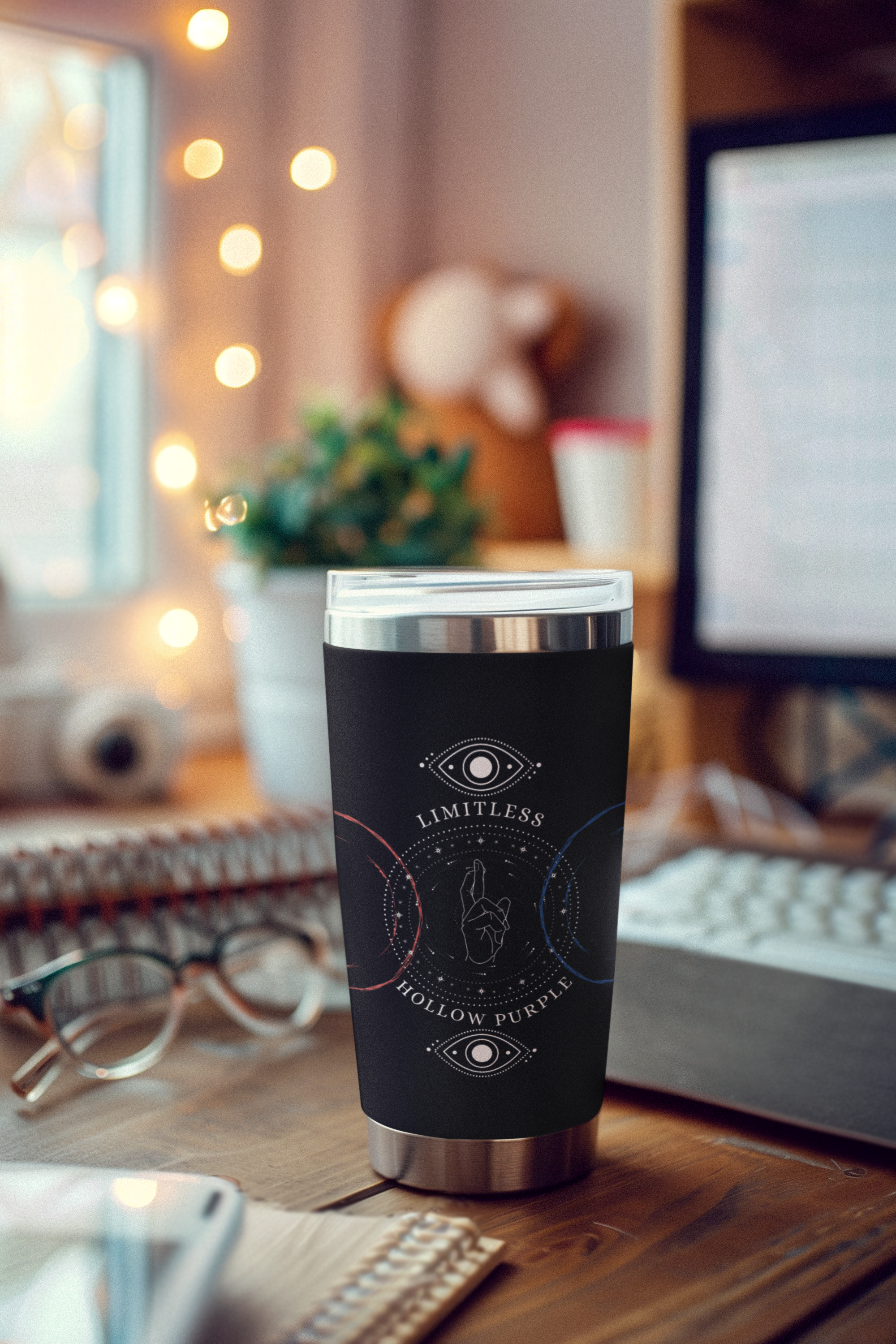 a coffee cup sitting on top of a wooden desk