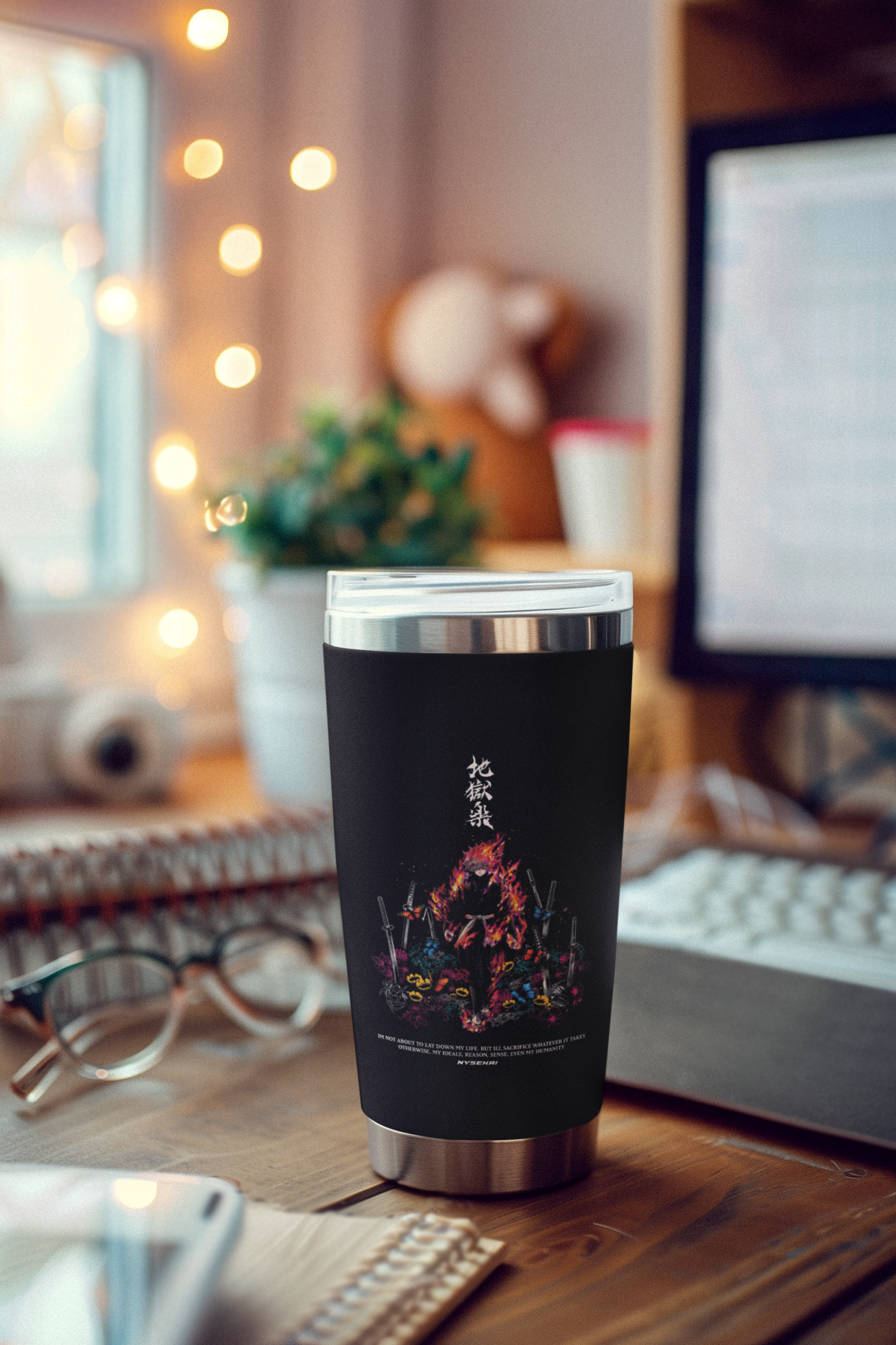 a coffee cup sitting on top of a wooden desk