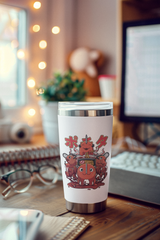 a coffee cup sitting on top of a wooden desk