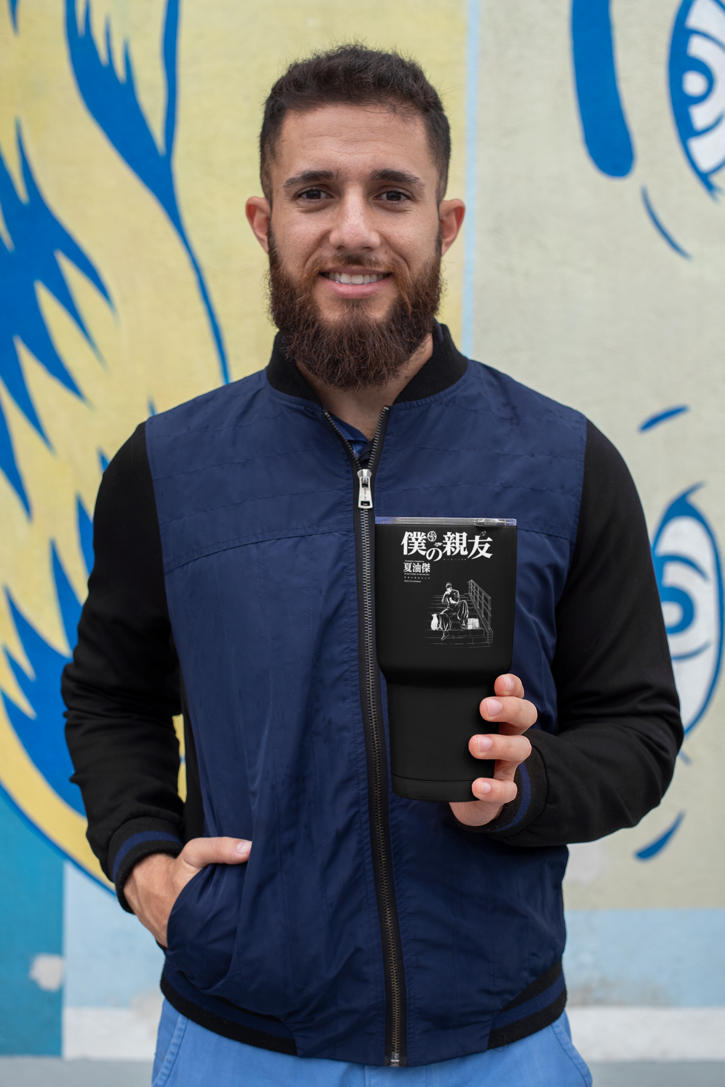 a man with a beard holding a book