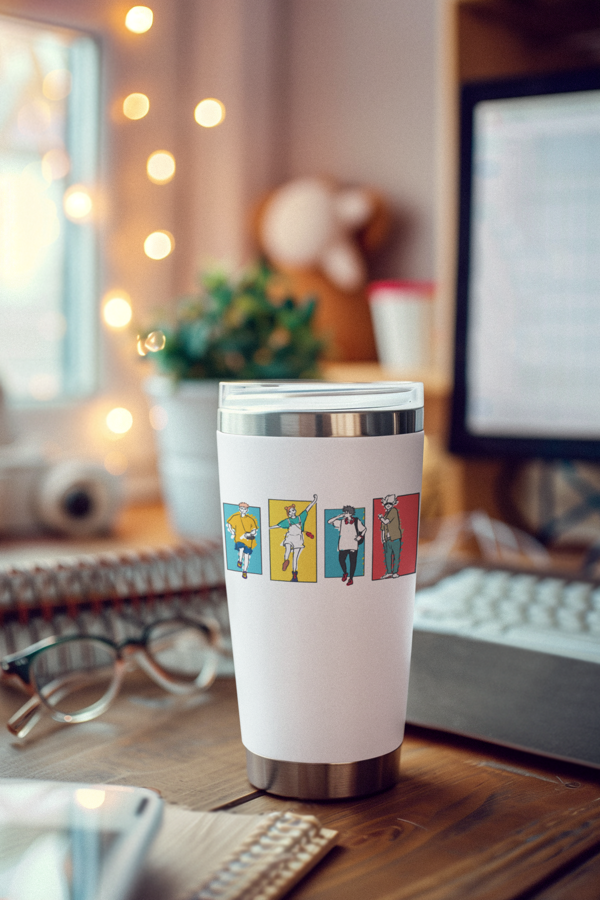 a coffee cup sitting on top of a wooden desk