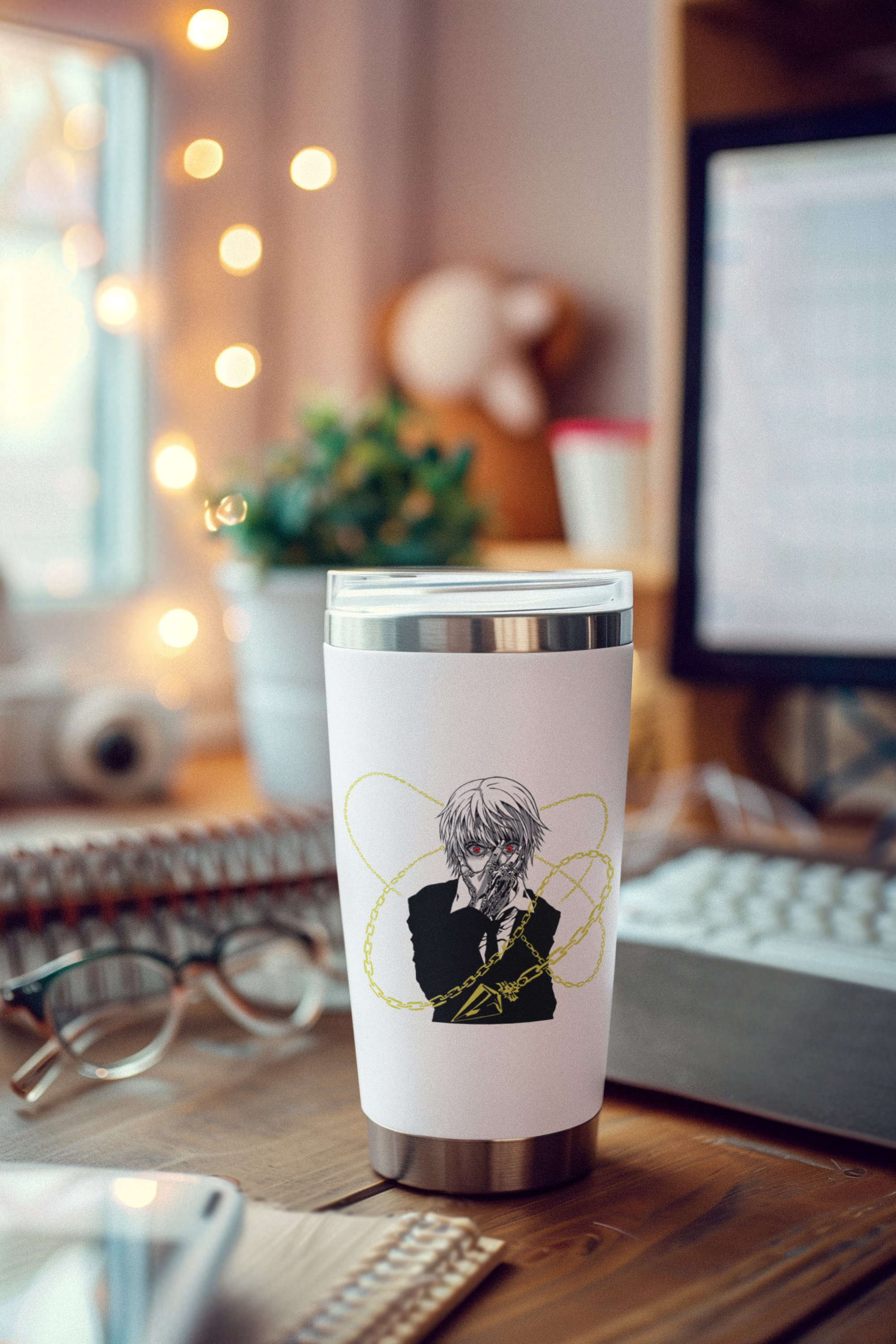 a cup sitting on top of a wooden desk