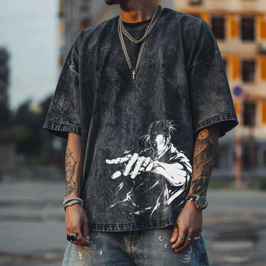 a man wearing a black shirt with a picture of a person on it