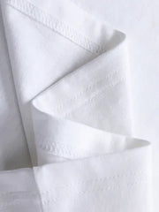 a close up of a folded white shirt