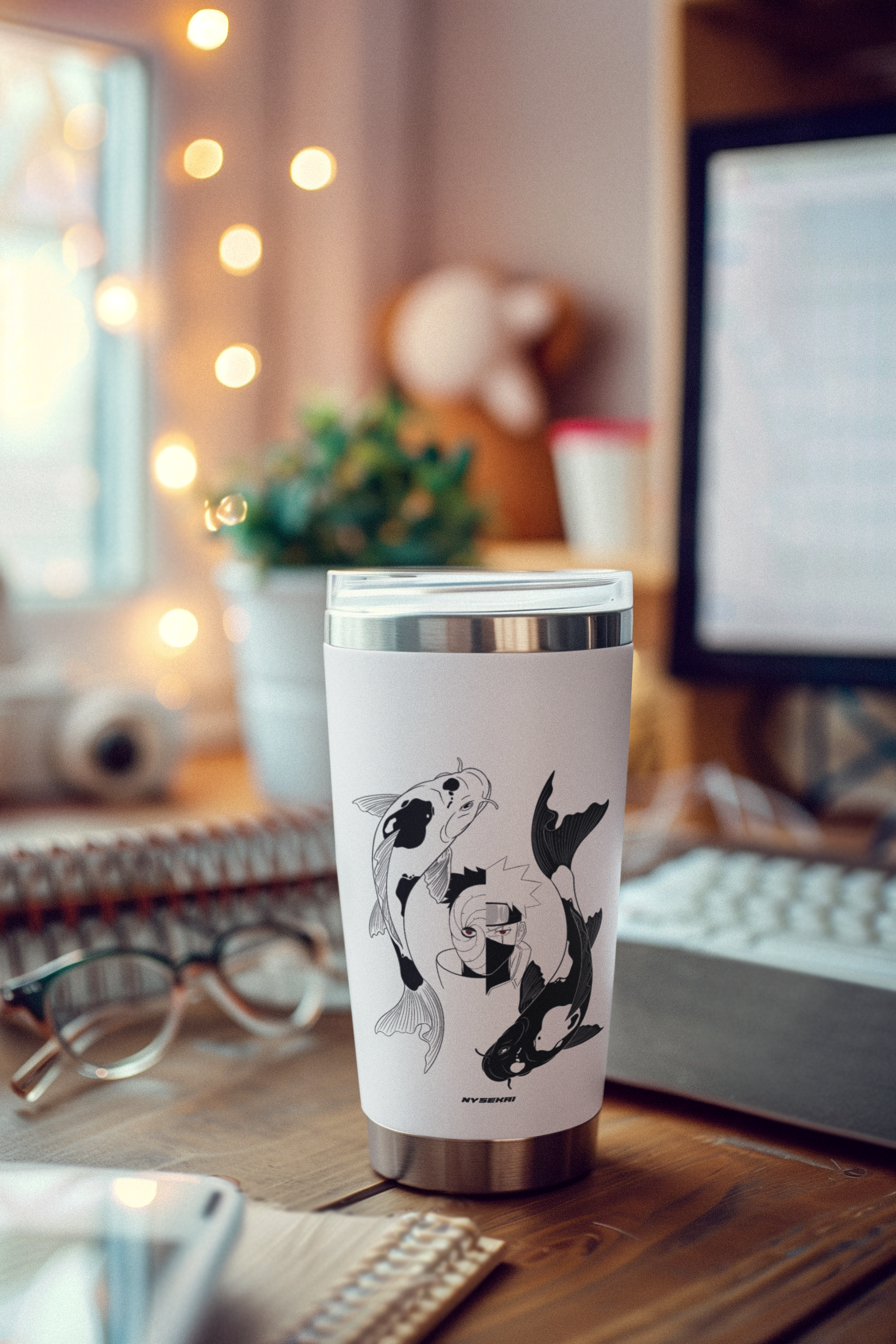 a coffee cup sitting on top of a wooden desk