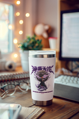 a coffee cup sitting on top of a wooden desk