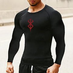 a man wearing a black shirt with a red design on it