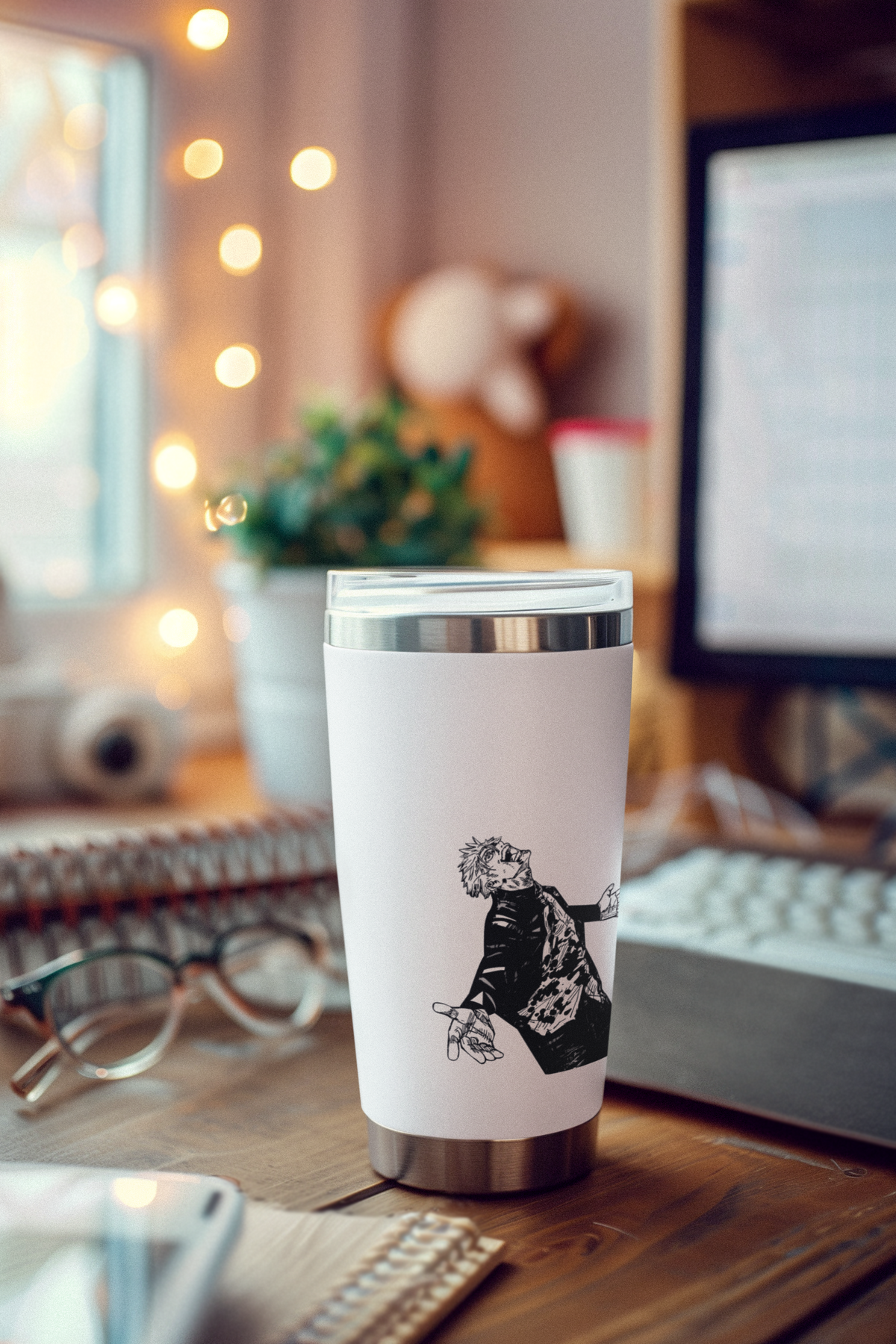 a cup sitting on top of a wooden desk