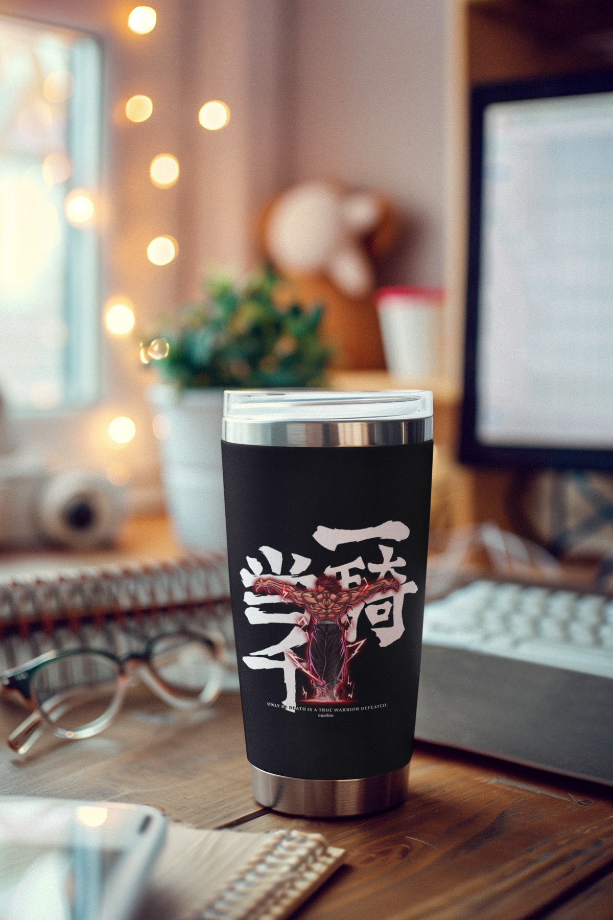 a cup sitting on top of a wooden desk