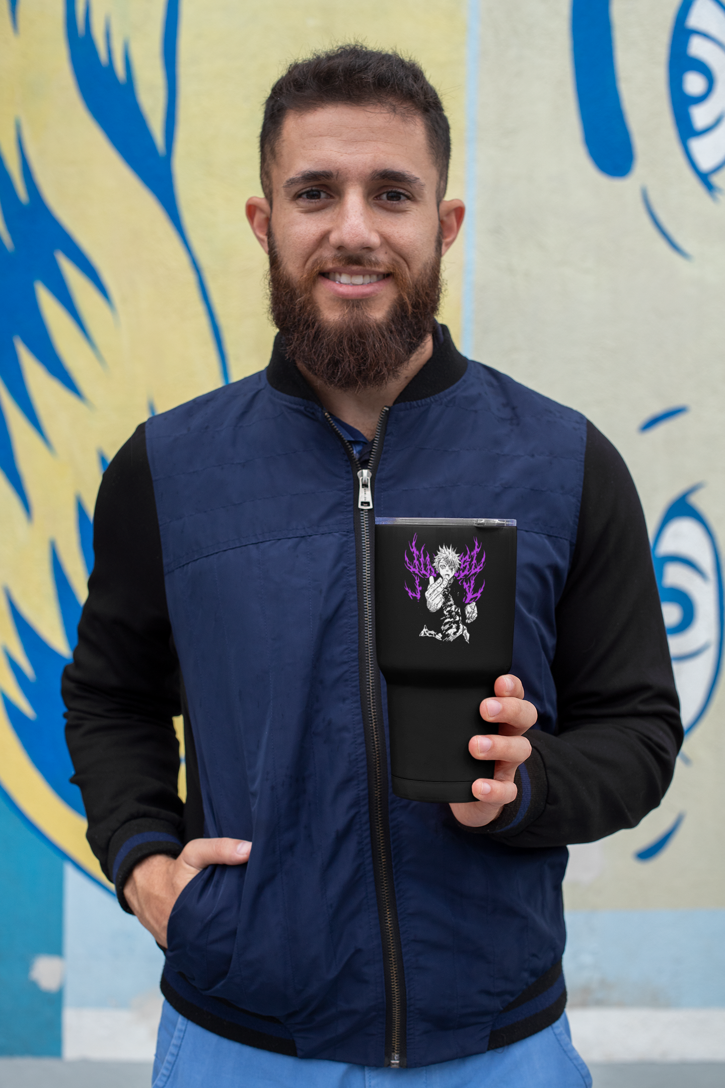 a man with a beard holding a tablet