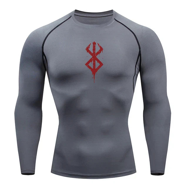 a grey shirt with a red design on the chest