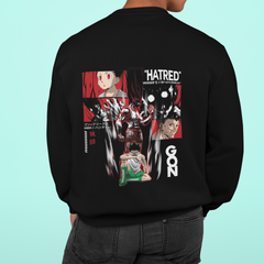 a man wearing a black hoodie with images of characters on it