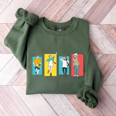 a green sweatshirt with cartoon characters on it