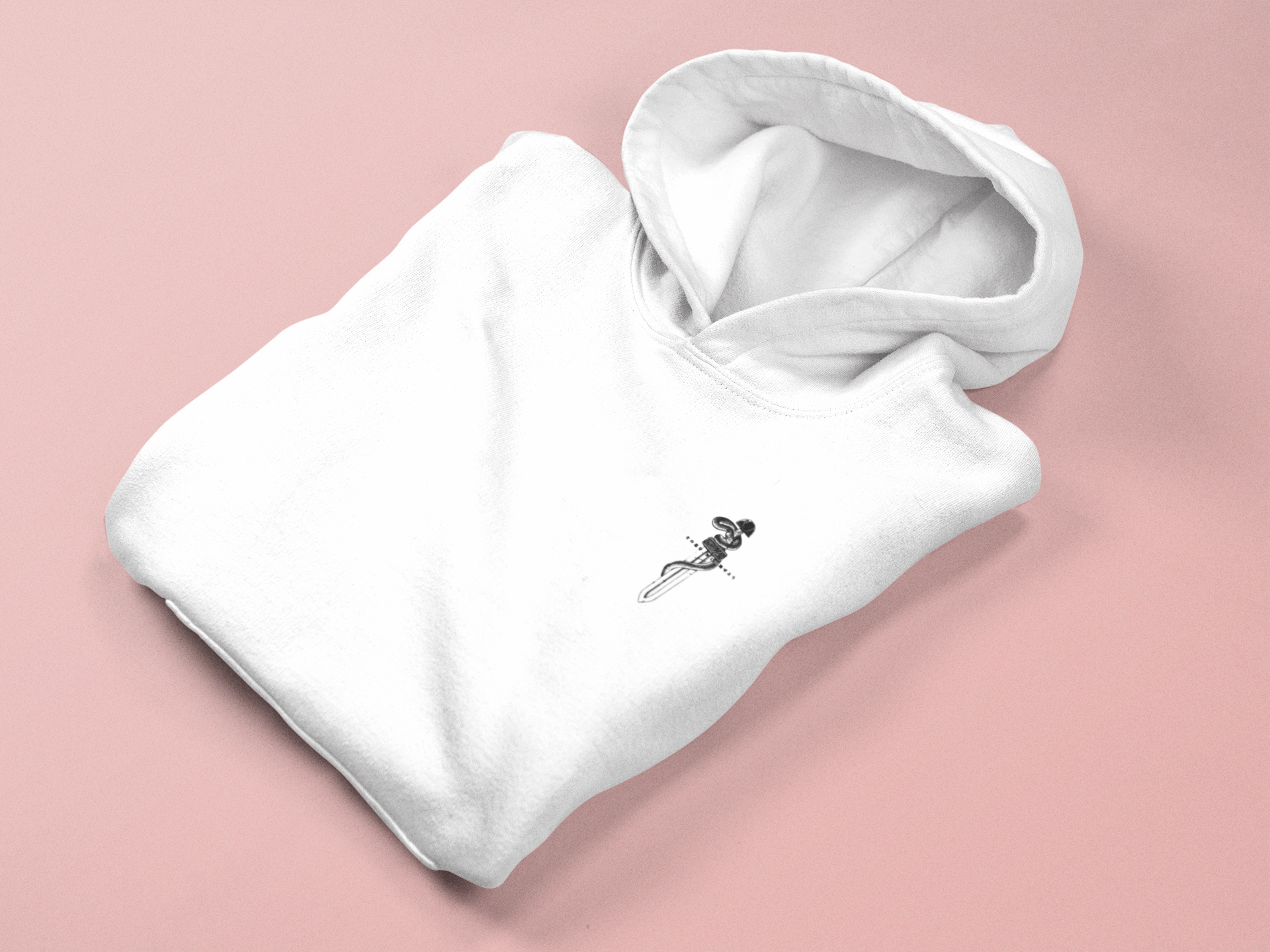 a white hoodie on a pink background