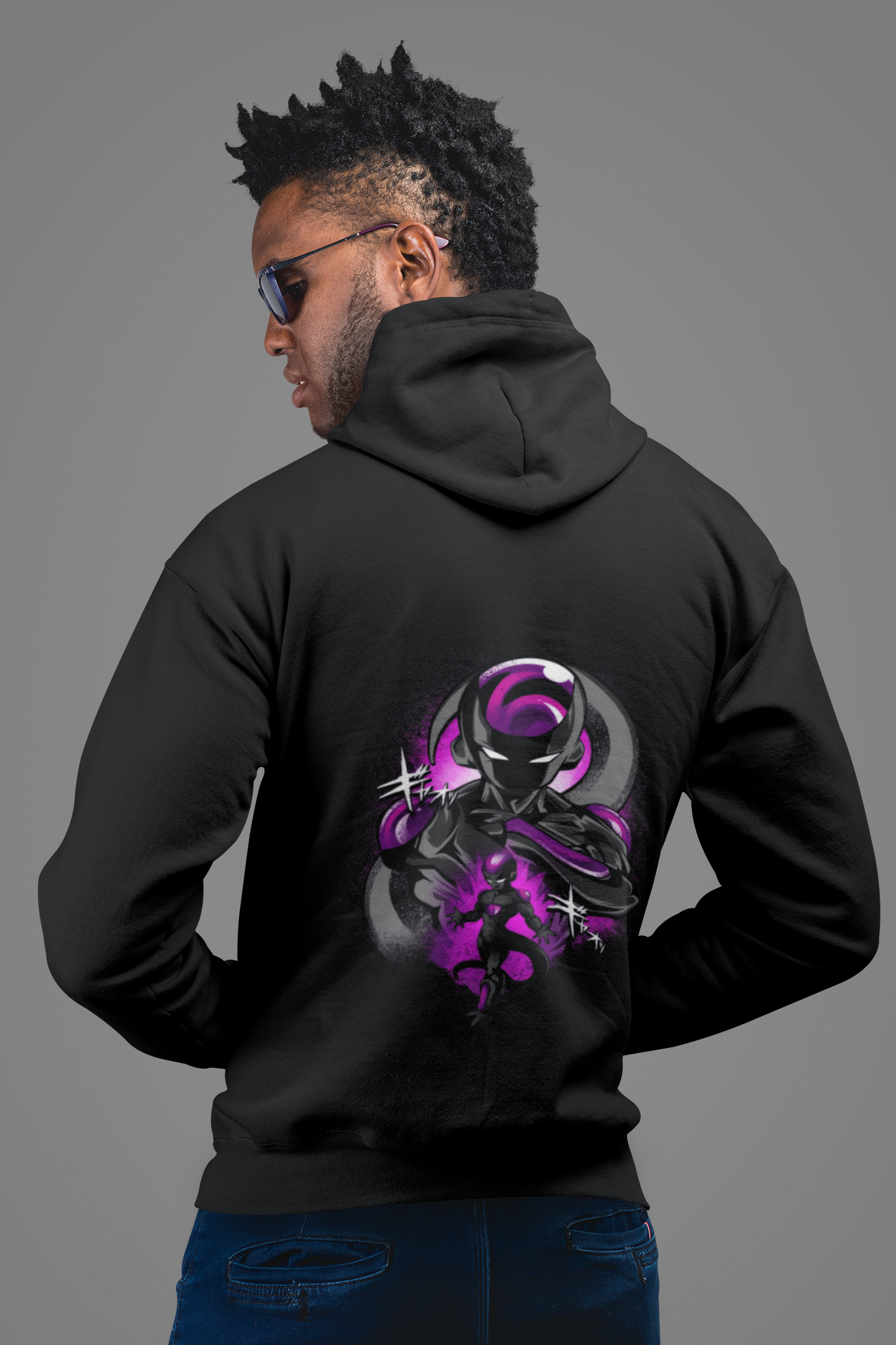 a man wearing a black hoodie with a purple design on it