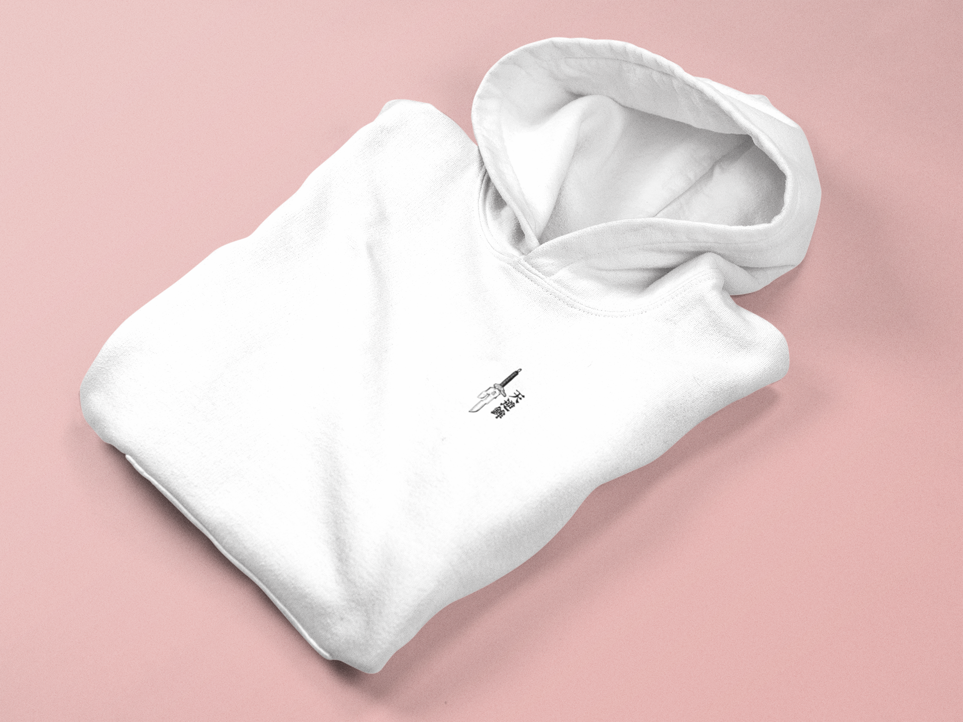 a white hoodie on a pink background