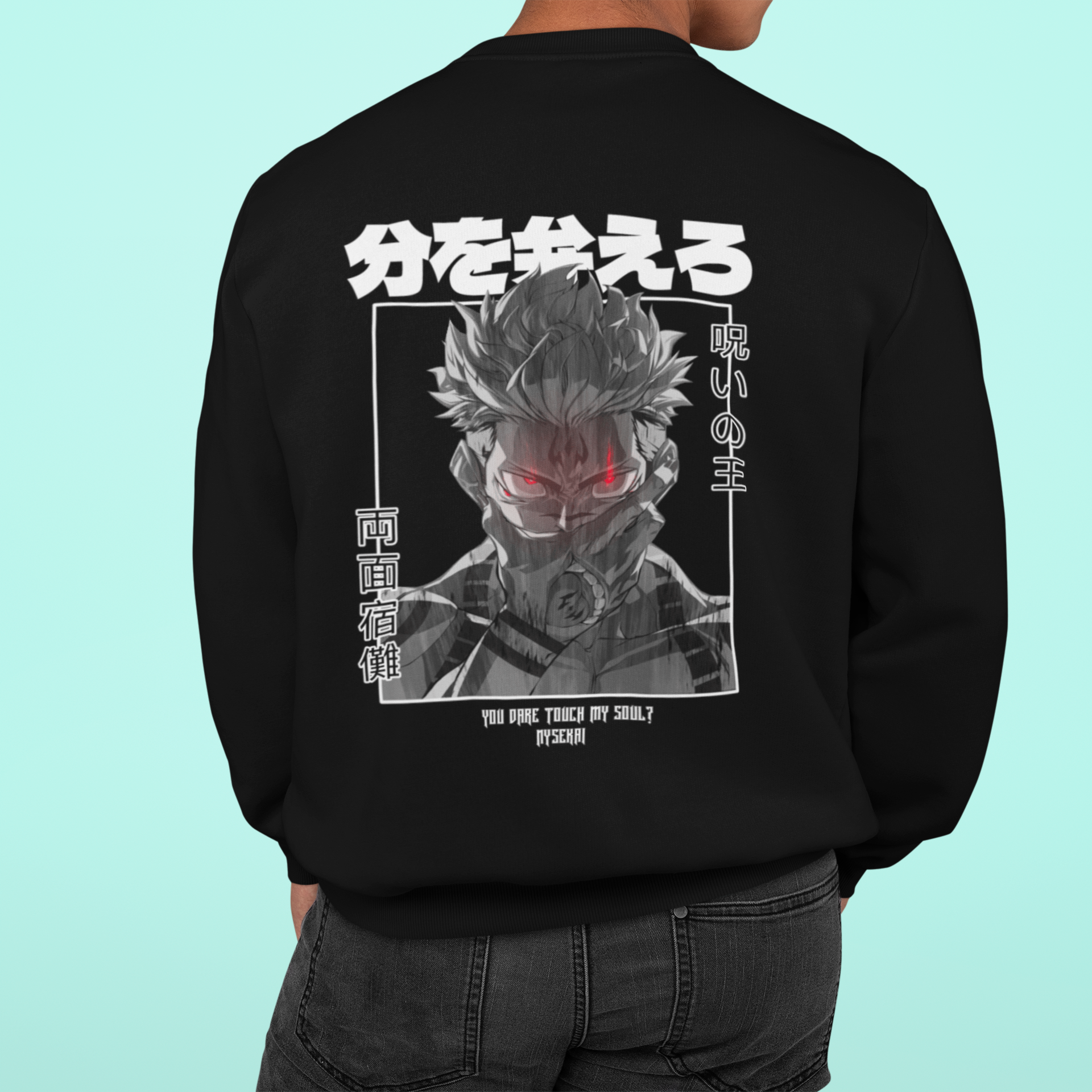 a man wearing a black hoodie with a picture of a demon on it