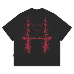 a black t - shirt with red flames on it