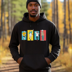 a man in a black hoodie is standing in the woods