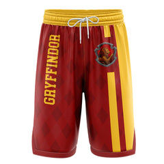 a red and yellow shorts with a bear on it