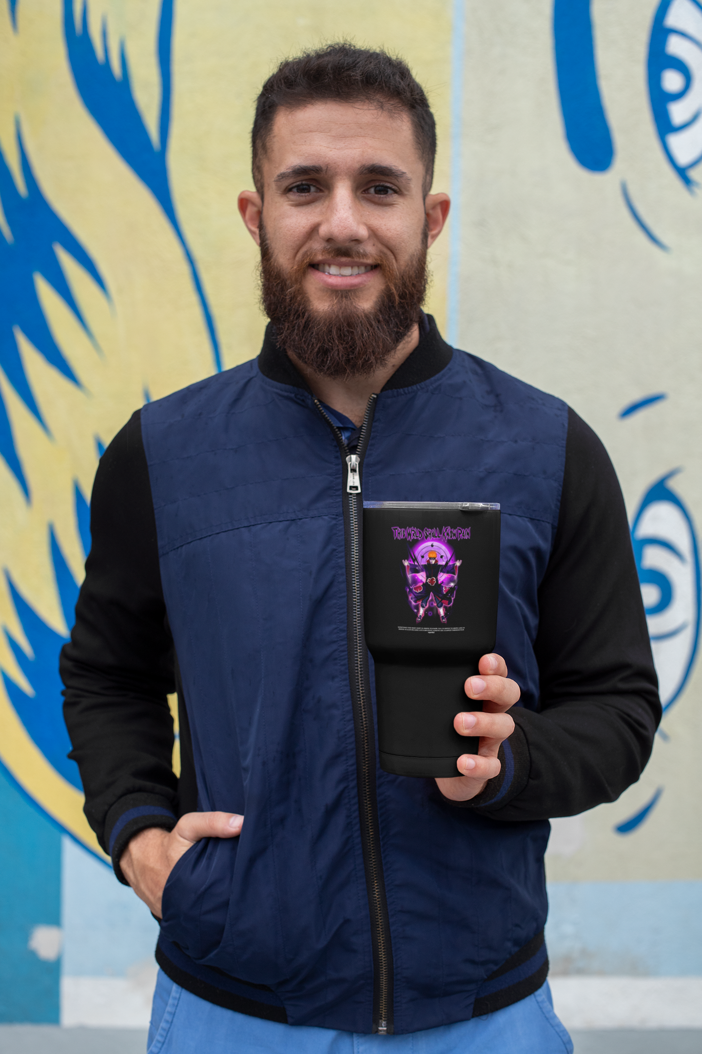 a man with a beard holding a tablet