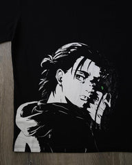 a black t - shirt with a picture of a man holding a gun