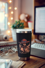 a cup sitting on top of a wooden desk