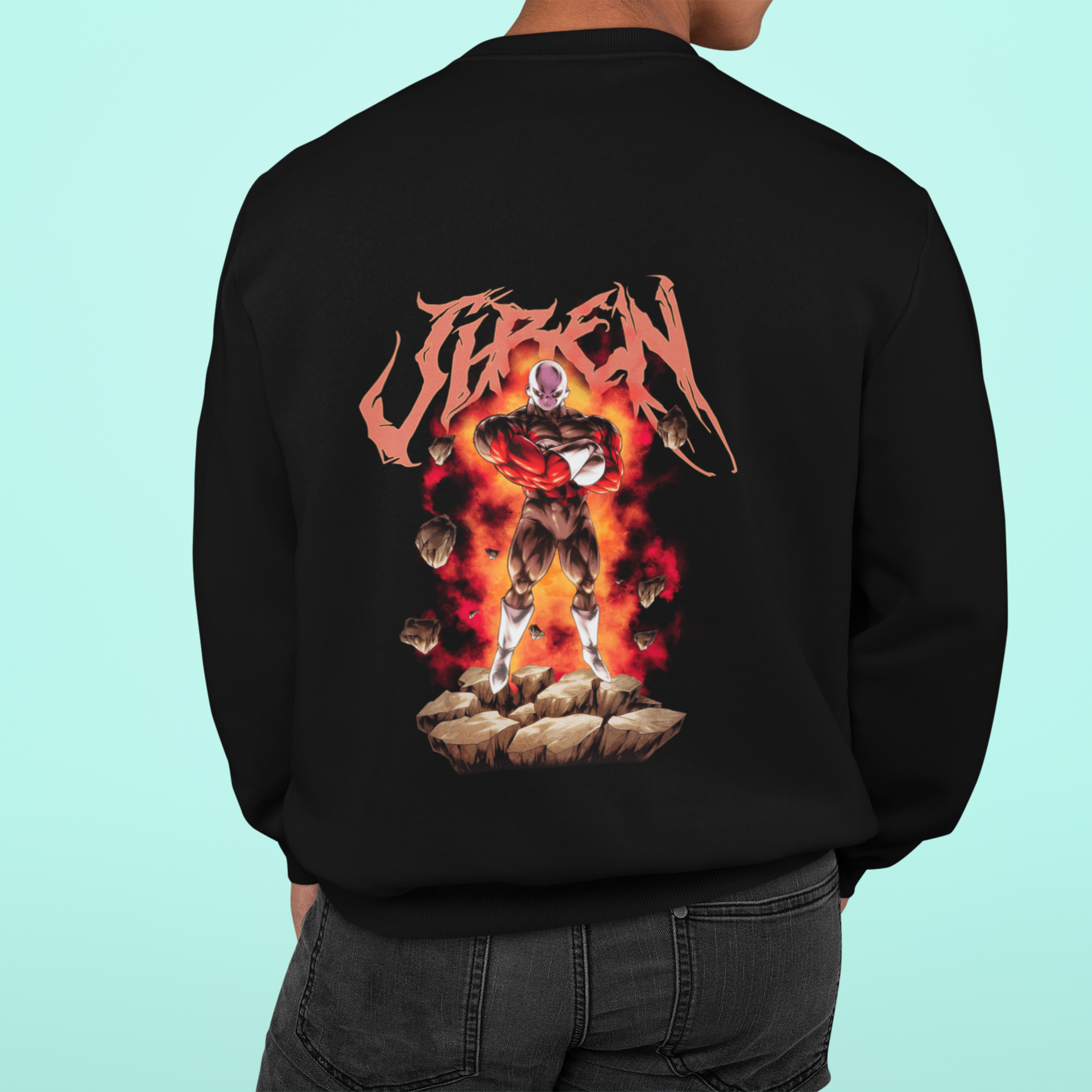 a man wearing a black sweatshirt with a picture of a demon on it