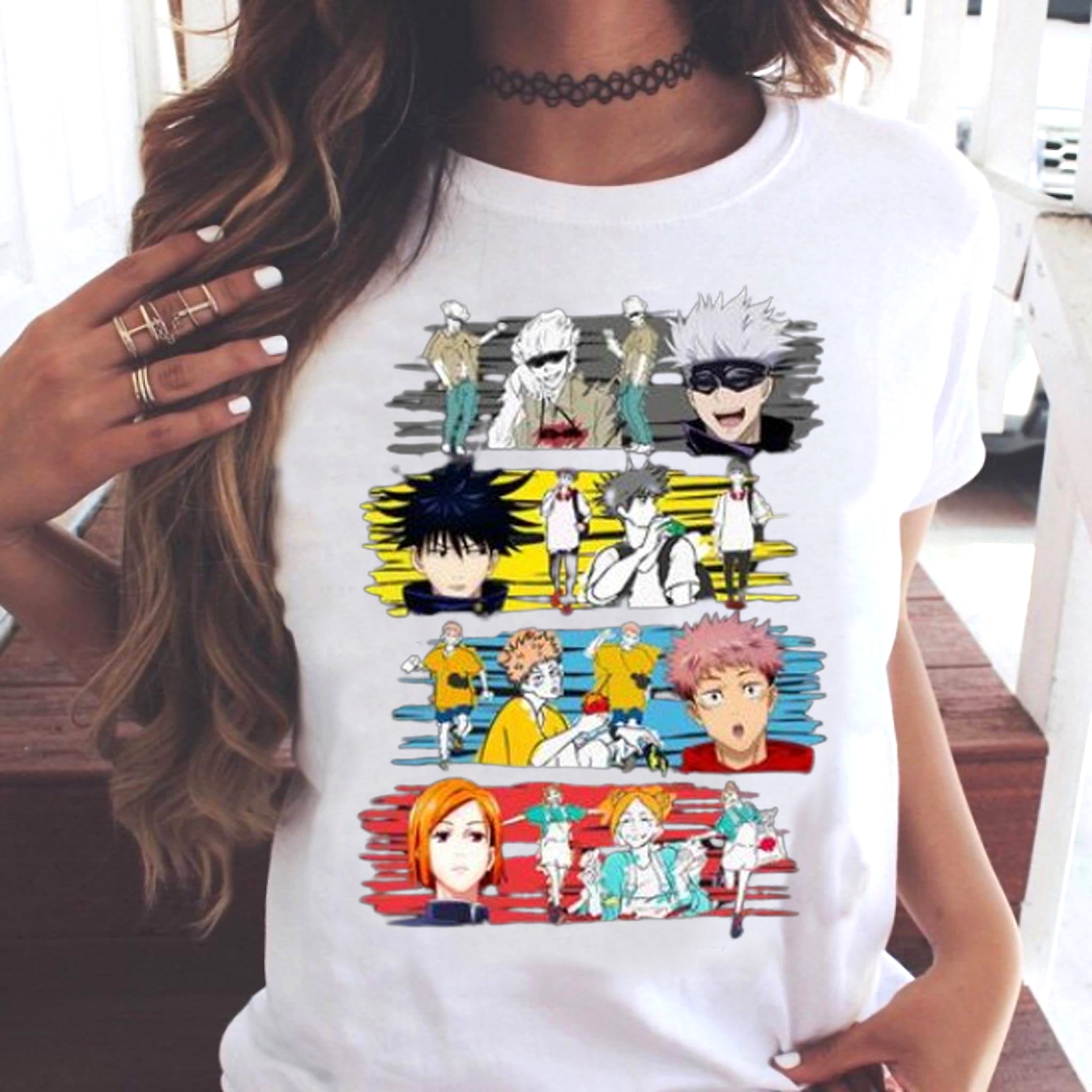 a woman wearing a white shirt with anime characters on it